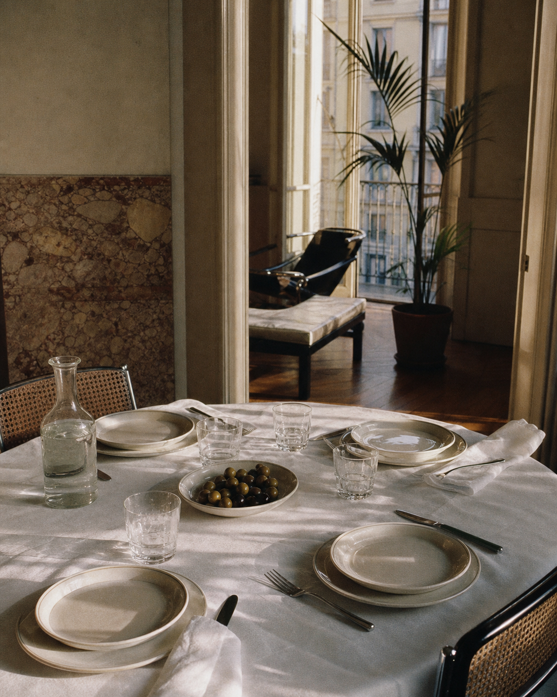 A restrained Mediterranean table set for friends